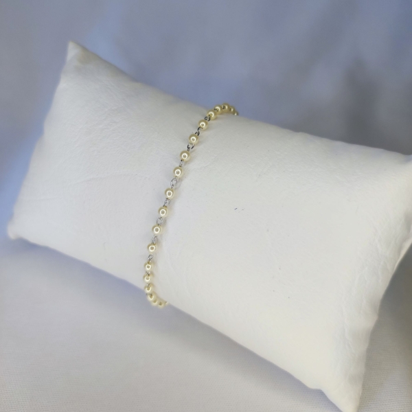 PULSEIRA COM PÉROLAS REDONDAS SEMIJOIA OURO 18K