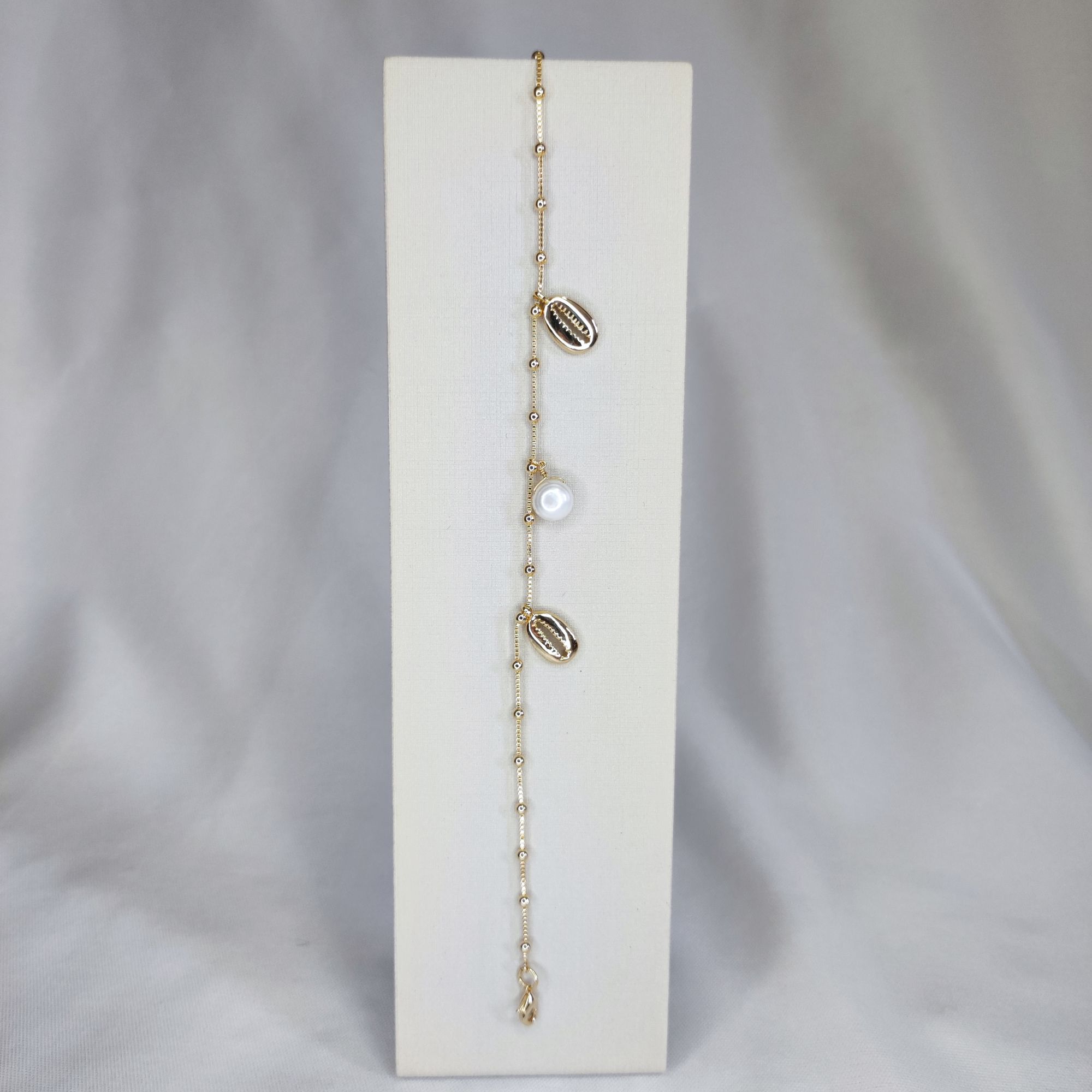 TORNOZELEIRA 2 BUZIOS METAL + 1 PEROLA