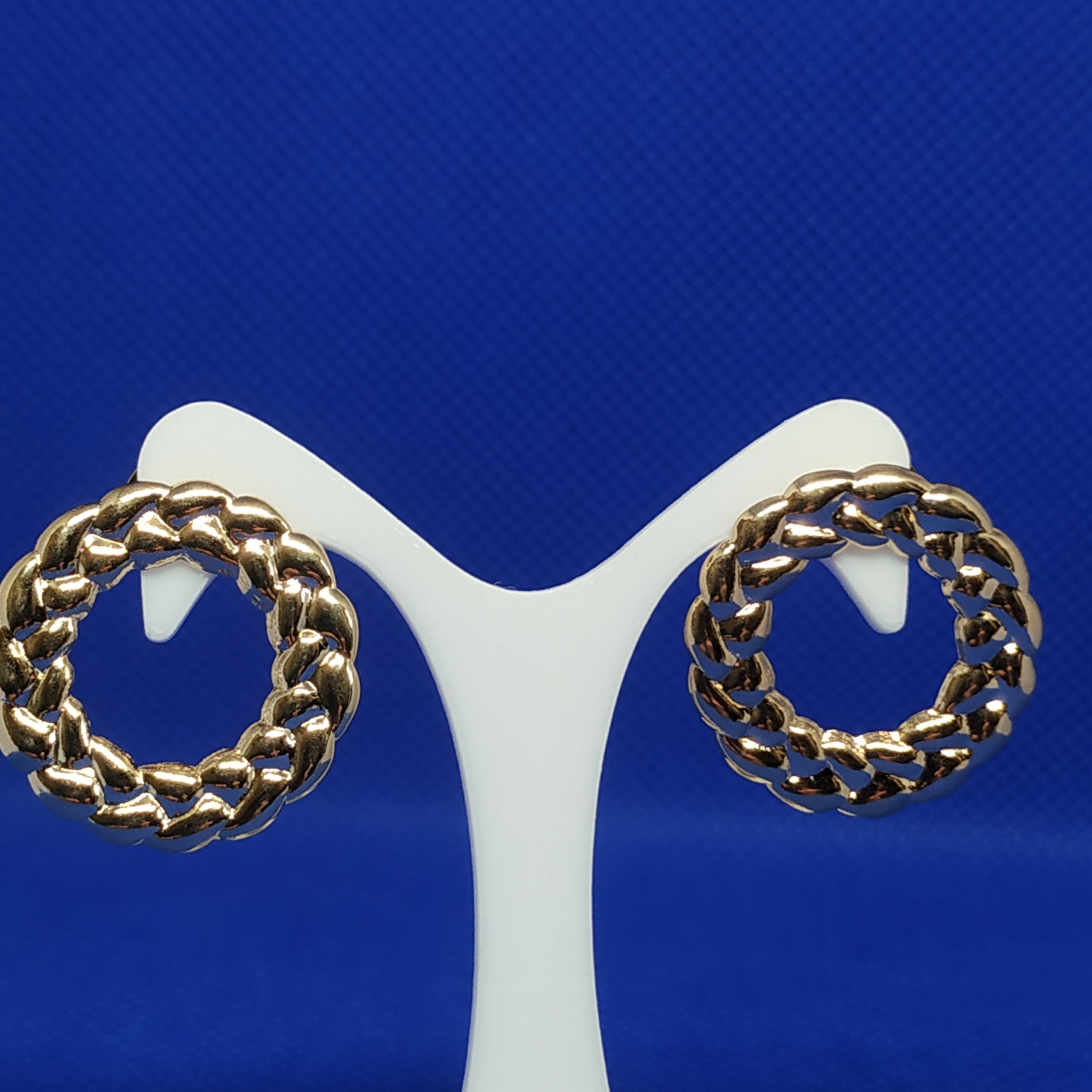 BRINCO CÍRCULO VAZADO TRANÇADO