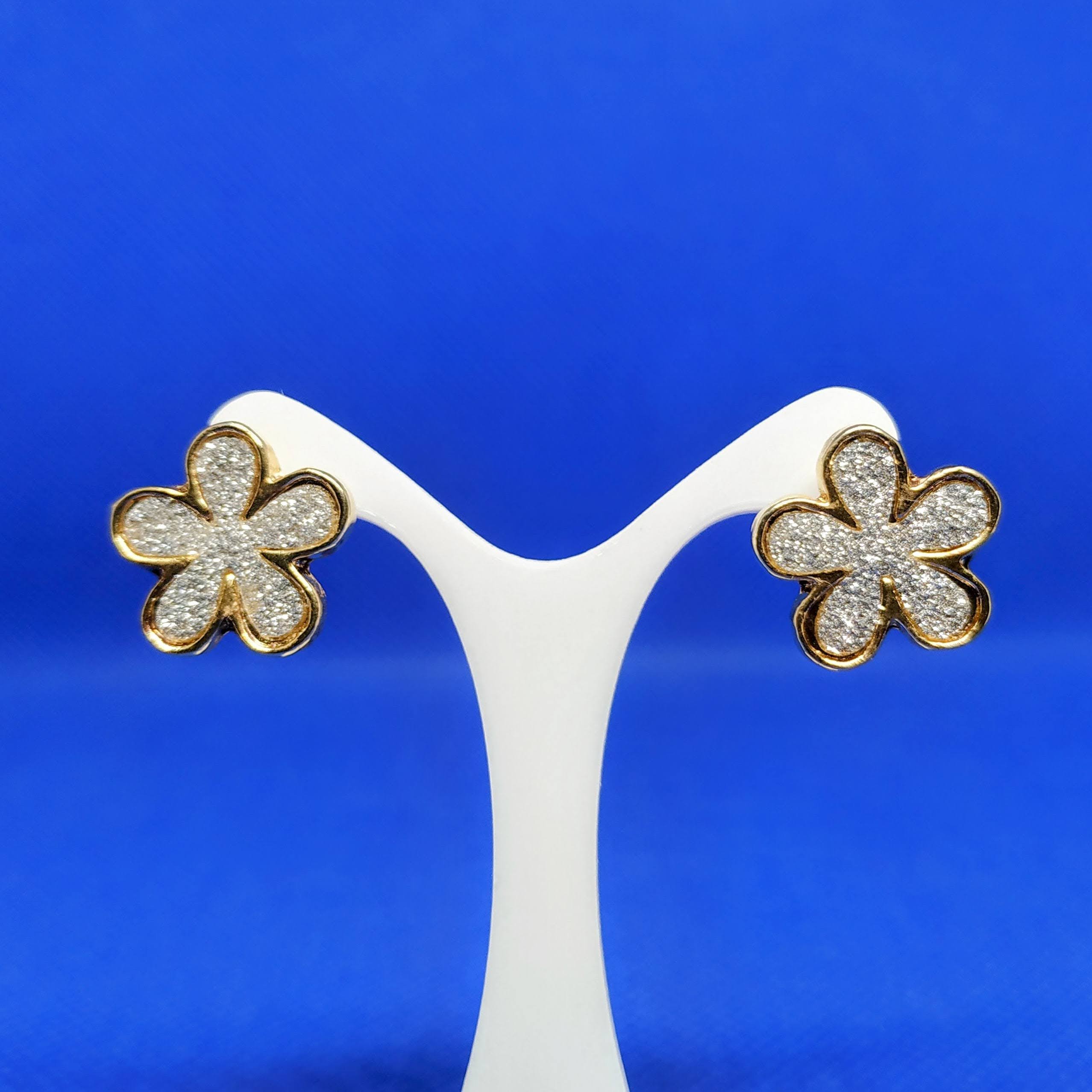 BRINCO FLOR COM STRASS